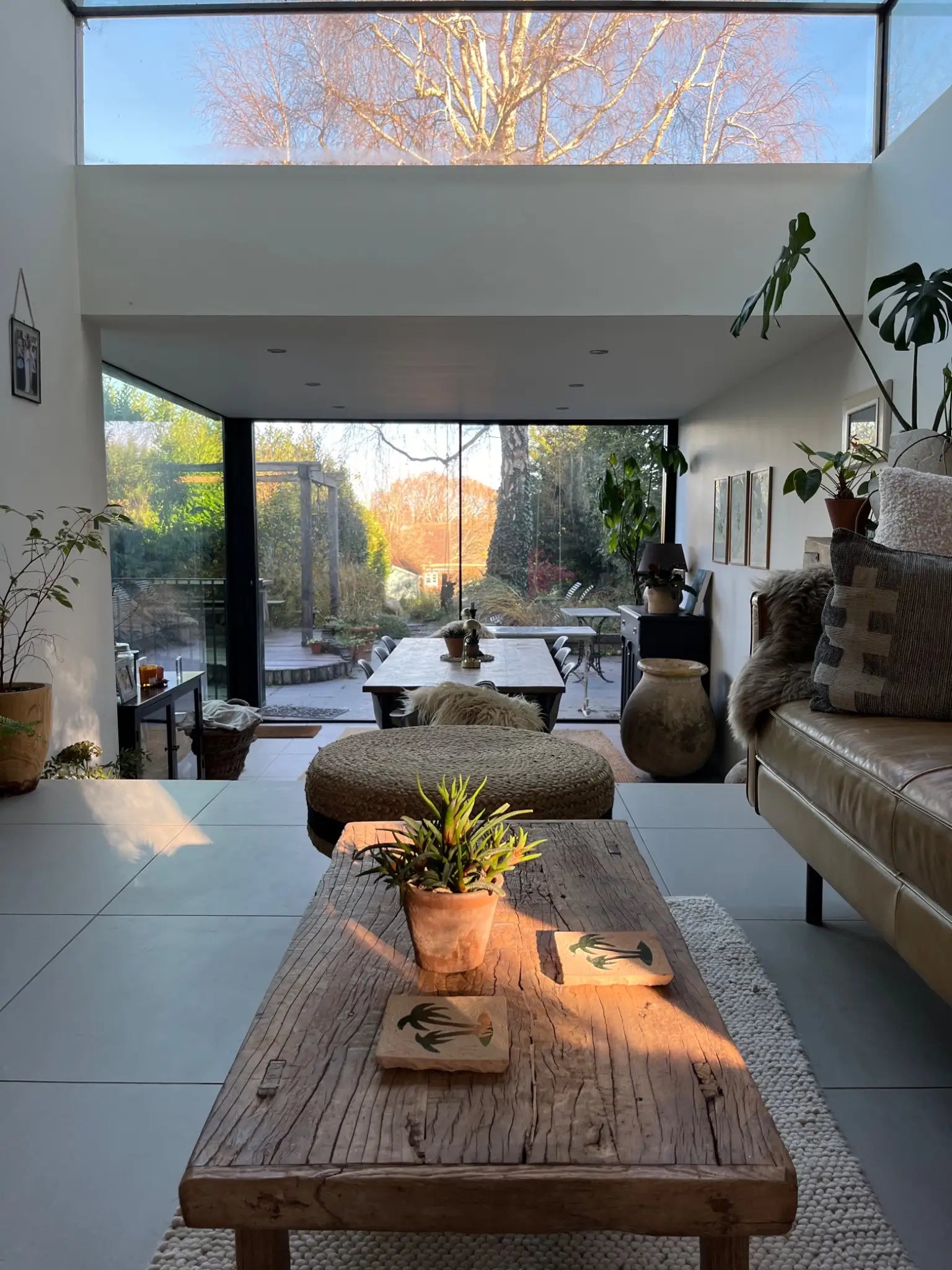 View through to the modern dining area with large glass sliding doors to the beautiful country garden. 